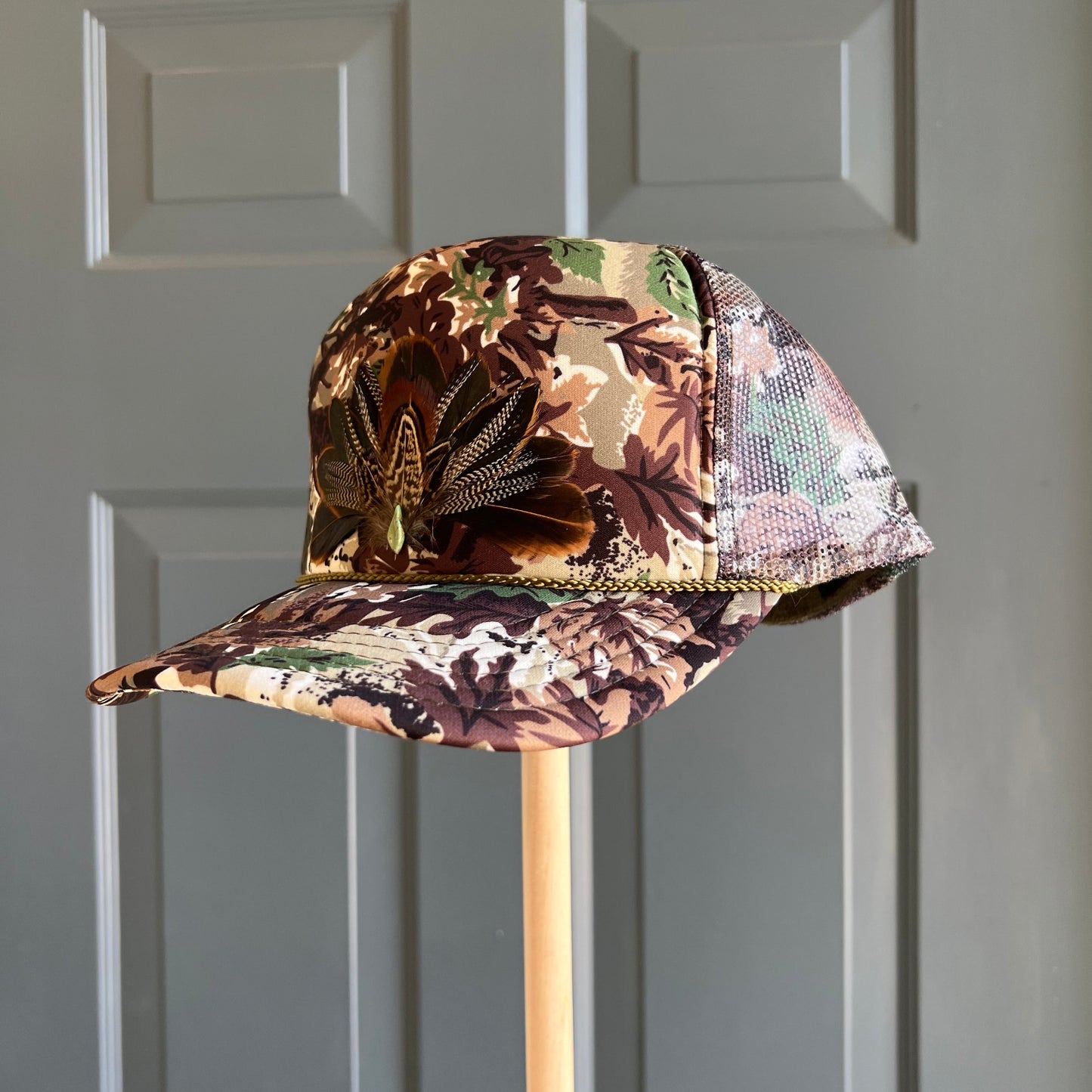 Abstract Camo Artemis Feathers Trucker Hat