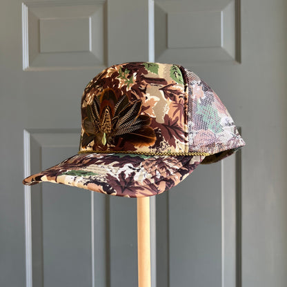 Abstract Camo Artemis Feathers Trucker Hat