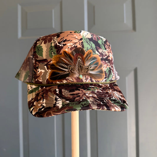 Abstract Camo Artemis Feathers Trucker Hat