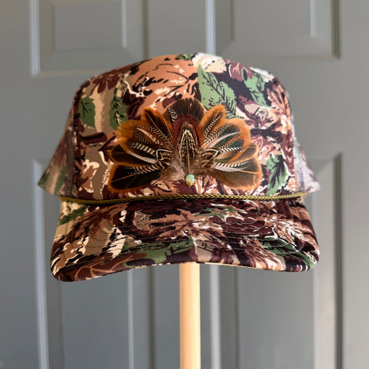 Abstract Camo Artemis Feathers Trucker Hat