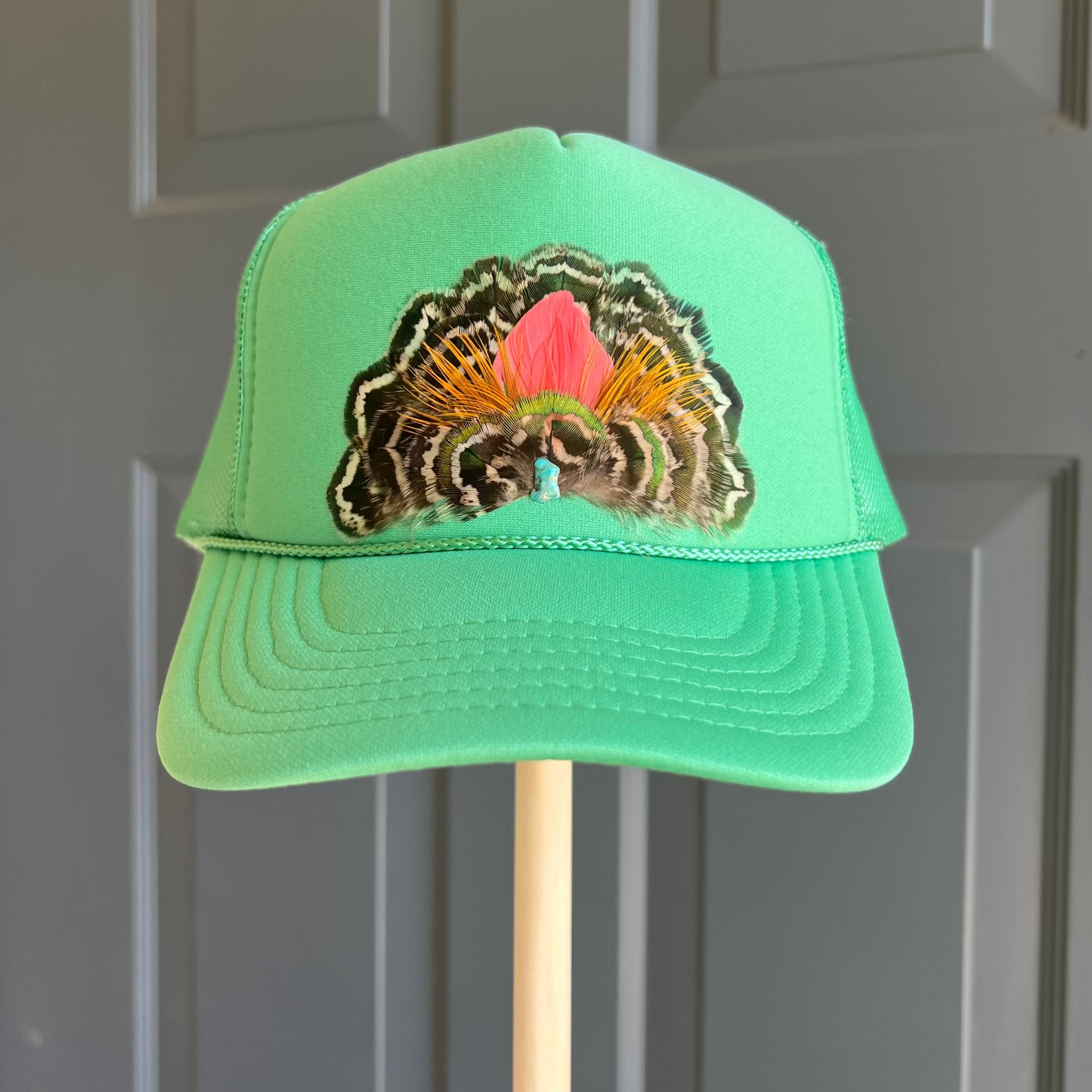Boho feather trucker hats, handcrafted wearable art for summer fashion by Volant Style