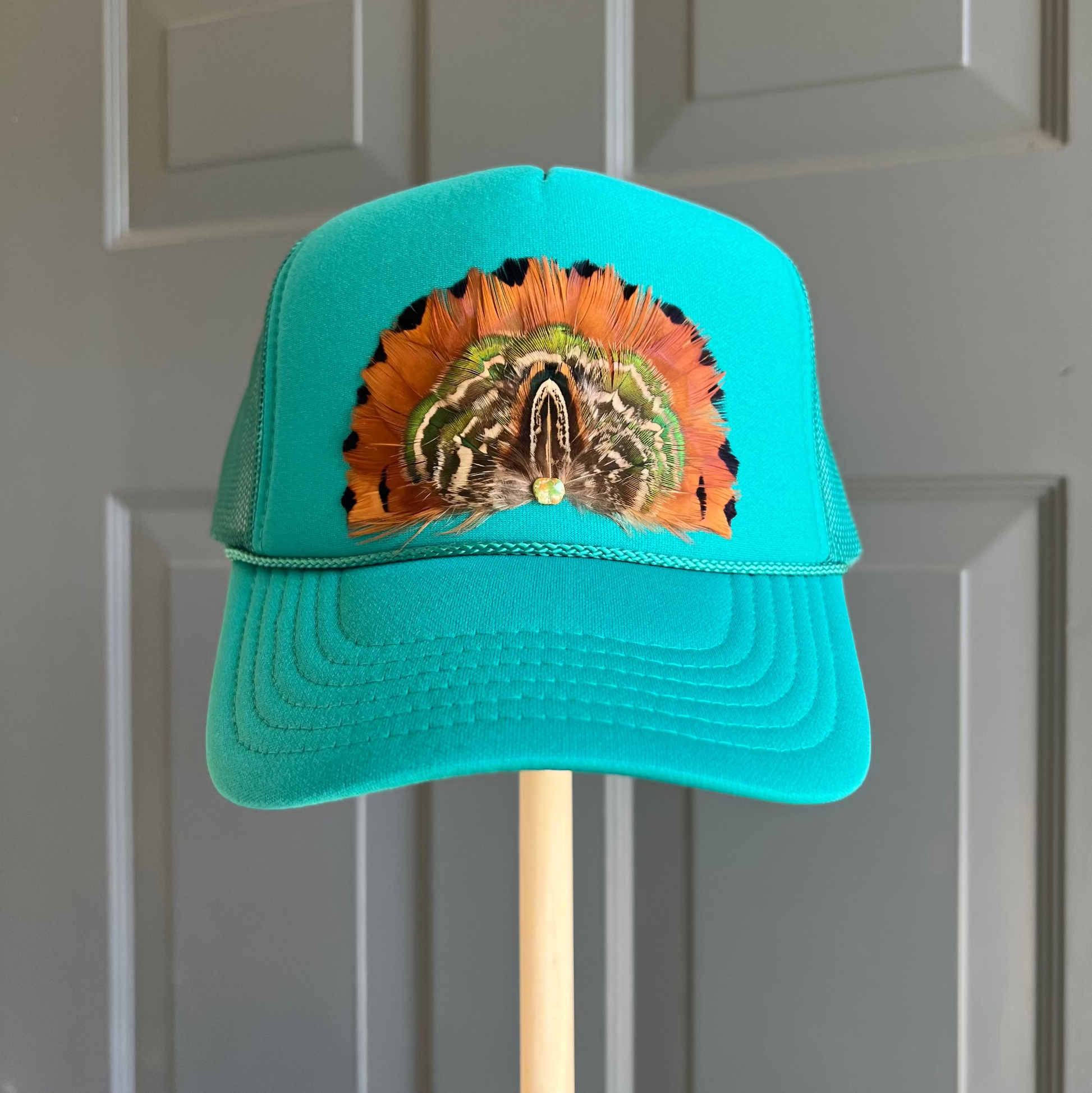 Boho feather trucker hats, handcrafted wearable art for summer fashion by Volant Style