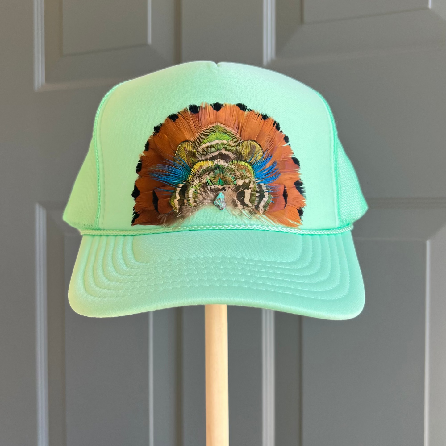 Boho feather trucker hats, handcrafted wearable art for summer fashion by Volant Style