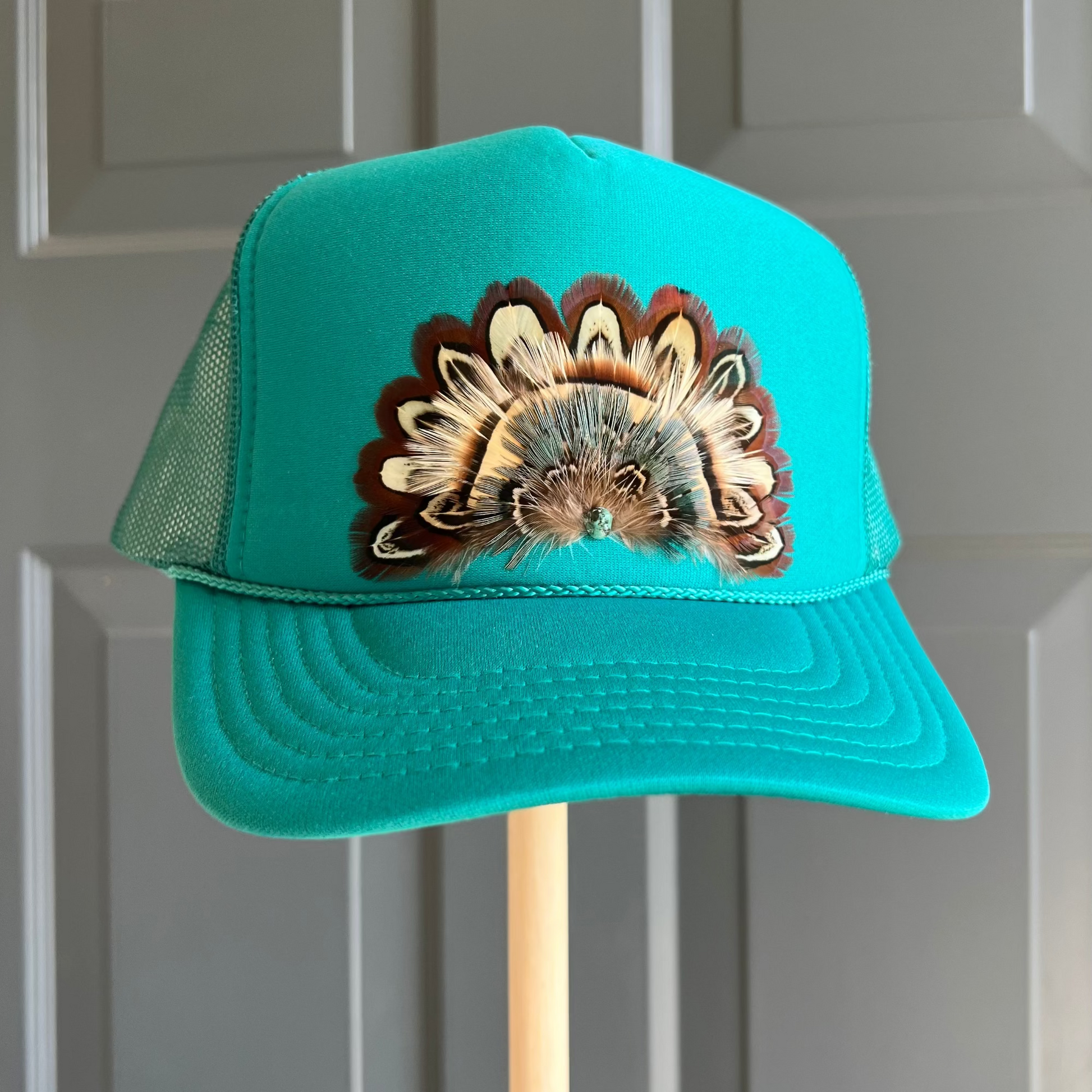 Boho feather trucker hats, handcrafted wearable art for summer fashion by Volant Style