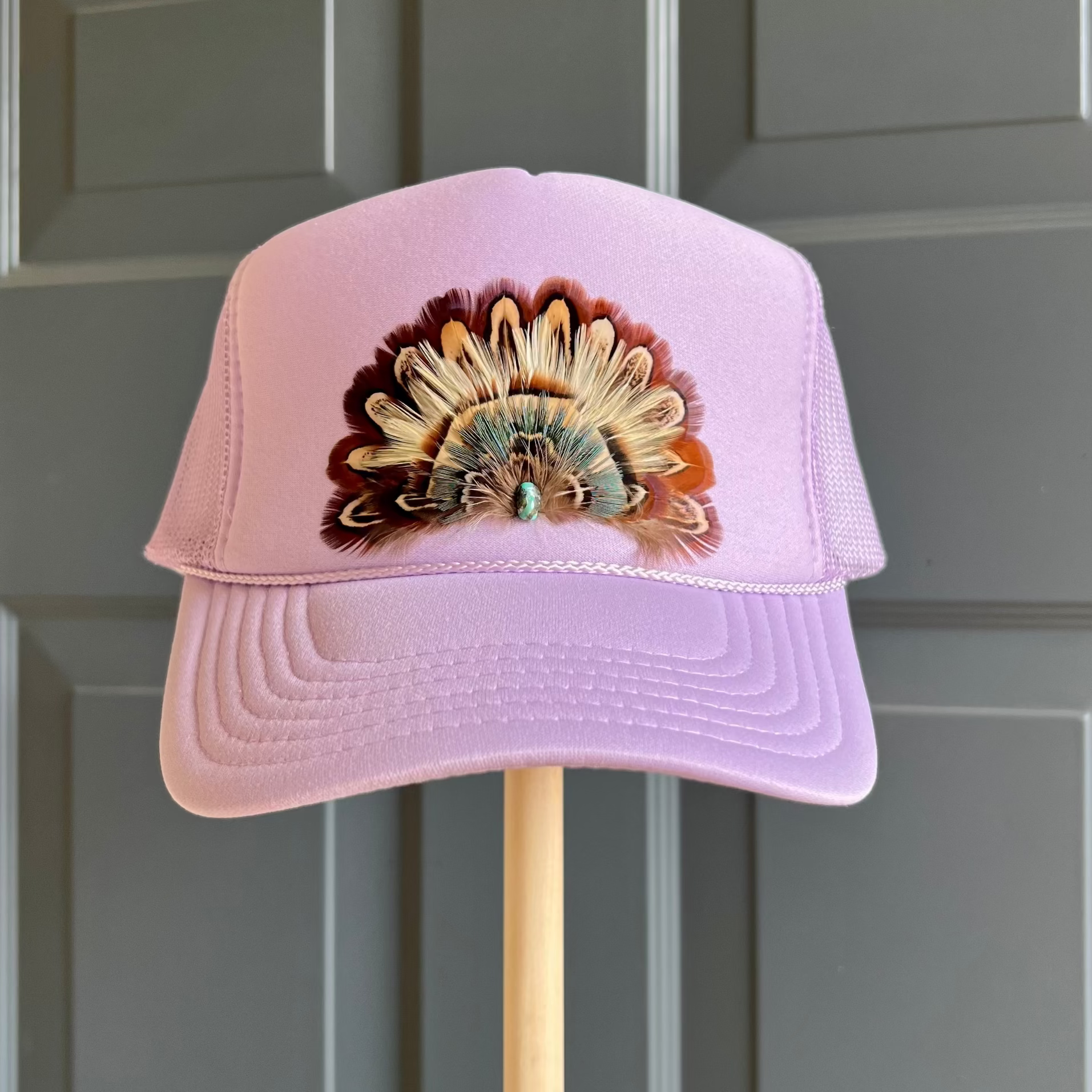 Boho feather trucker hats, handcrafted wearable art for summer fashion by Volant Style