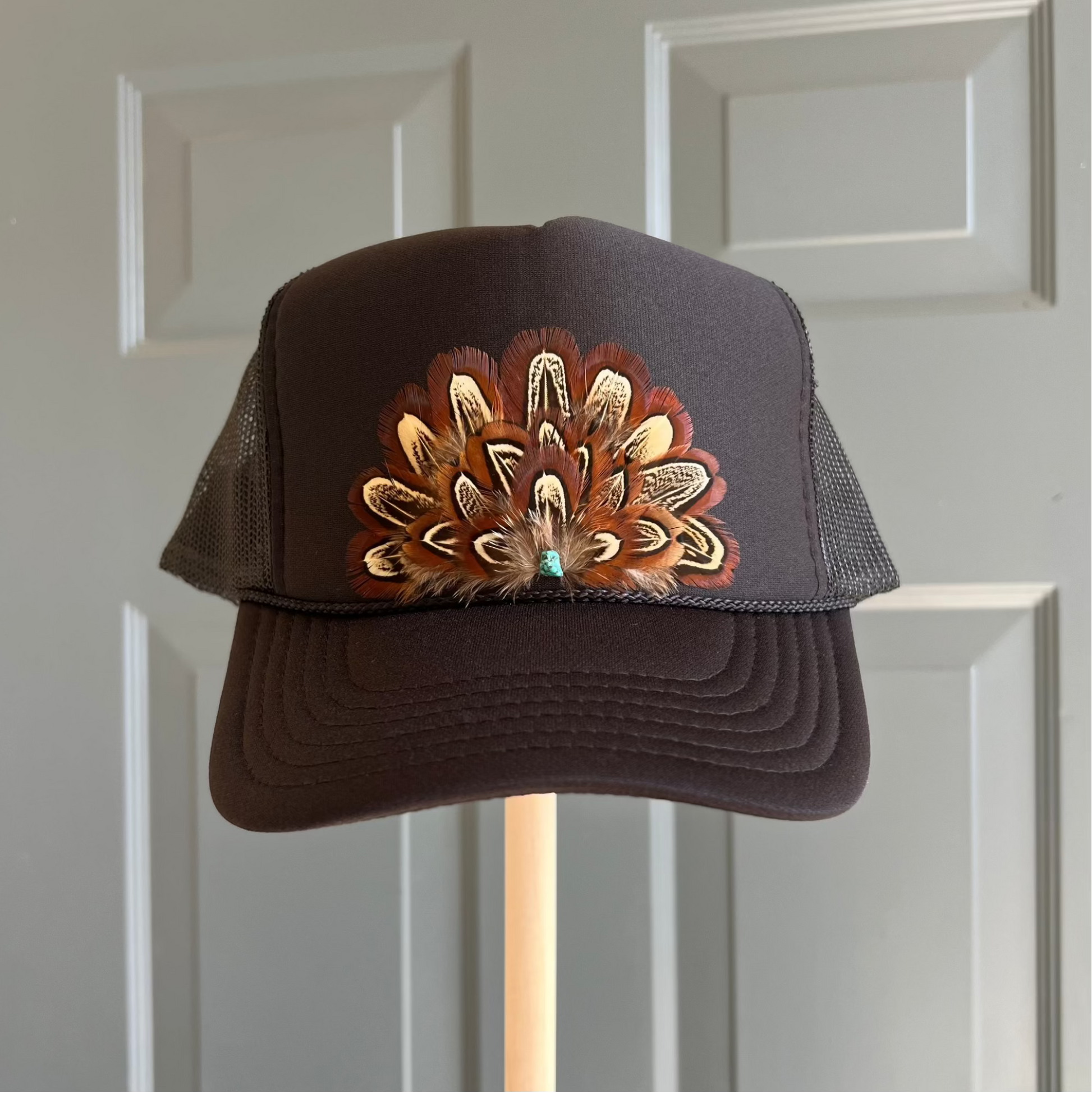Black feather trucker with pheasant feathers by Volant Style, handcrafted in Lafayette, LA