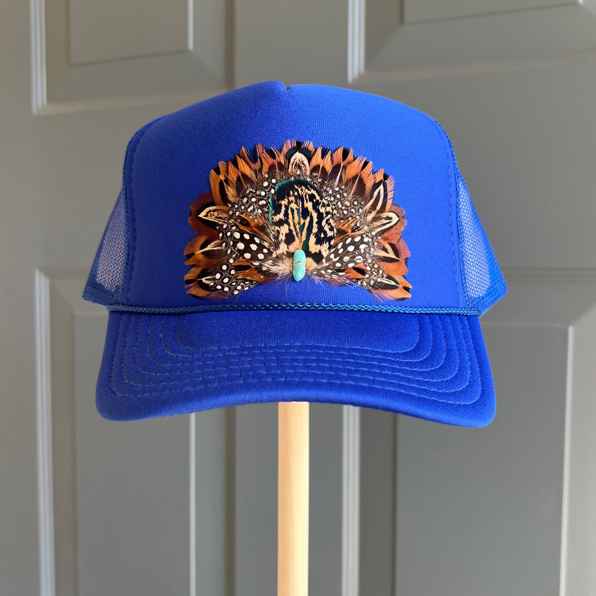 Boho feather trucker hats, handcrafted wearable art for summer fashion by Volant Style