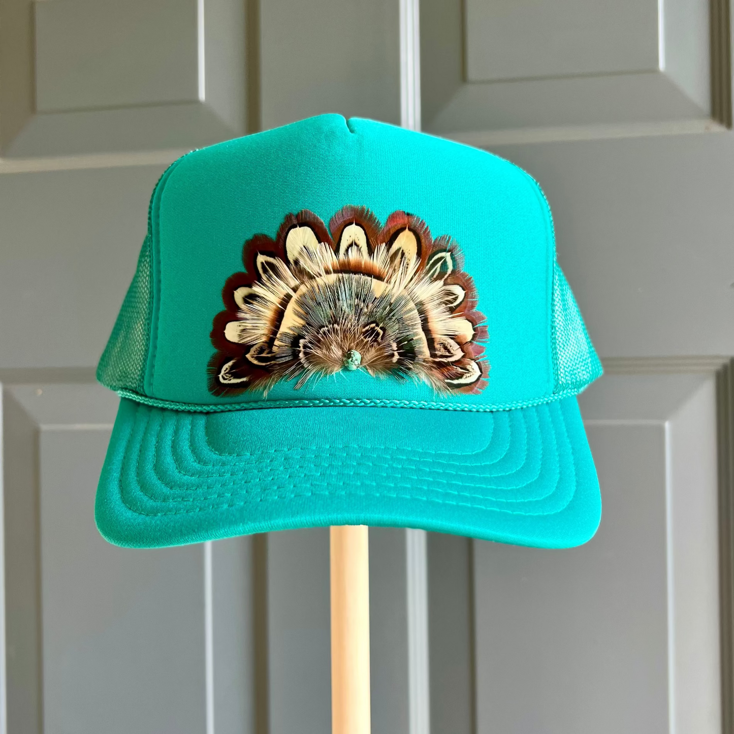 Boho feather trucker hats, handcrafted wearable art for summer fashion by Volant Style